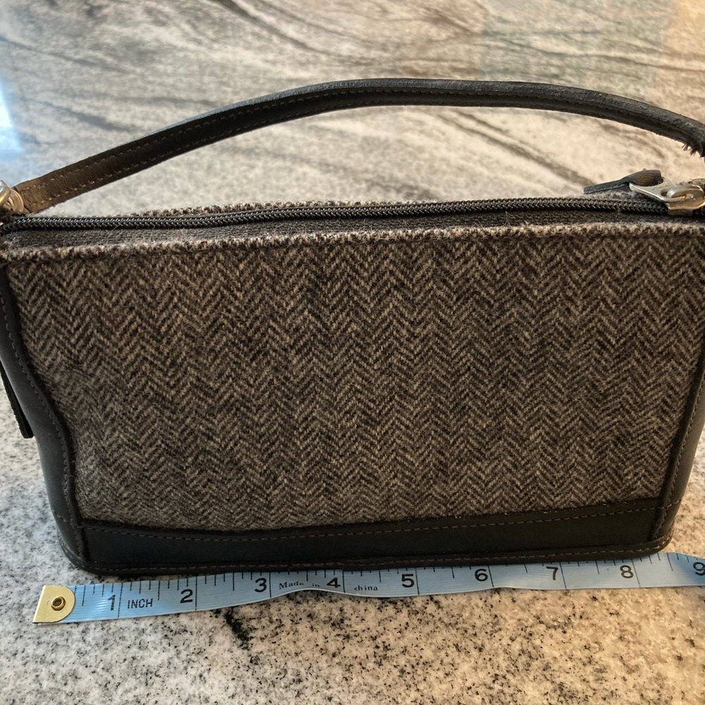 Coach small clutch with removable shoulder strap. New without tags.